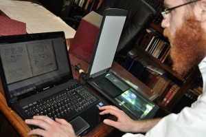 Mendy Alevsky scanning Rabbi Shapiro's address book he took to Russia. The whole book was written in codes! For example, Fort Lauderdale meant Leningrad and Miami meant Moscow. So when the Russian authorities looked at his address book, they thought it was his personal contacts from his home in the US.